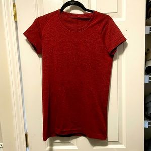 Red lululemon short sleep workout top, size 10